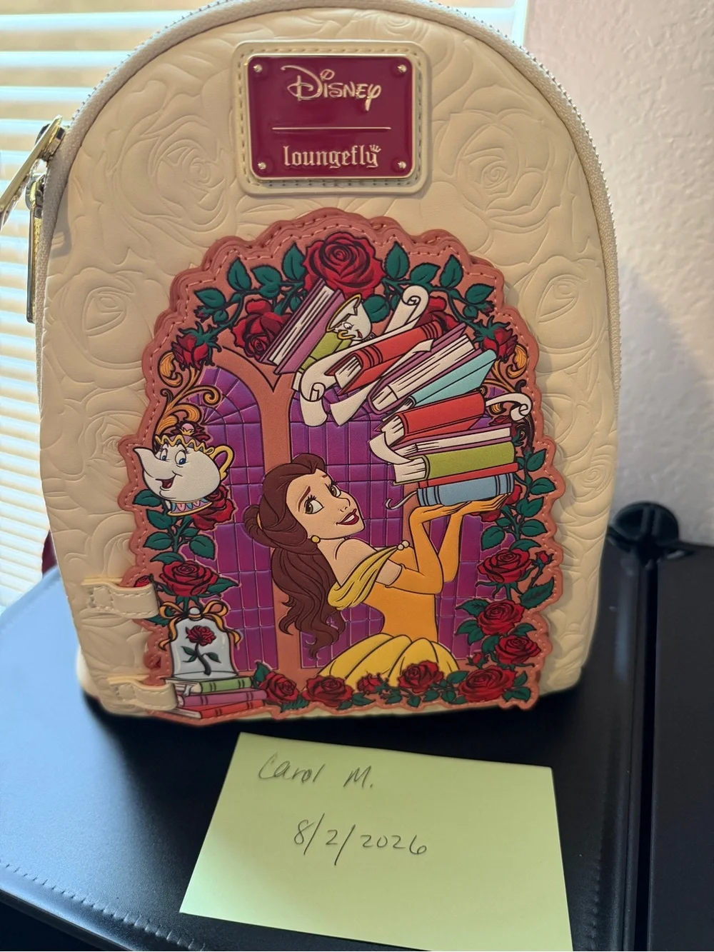 Loungefly Cream Belle Book-Scene Mini Backpack. Used once
